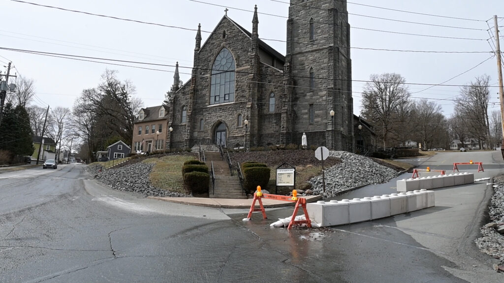 St. John’s Catholic Church in Honesdale, PA, with concrete barriers in place during the storm line repair project.