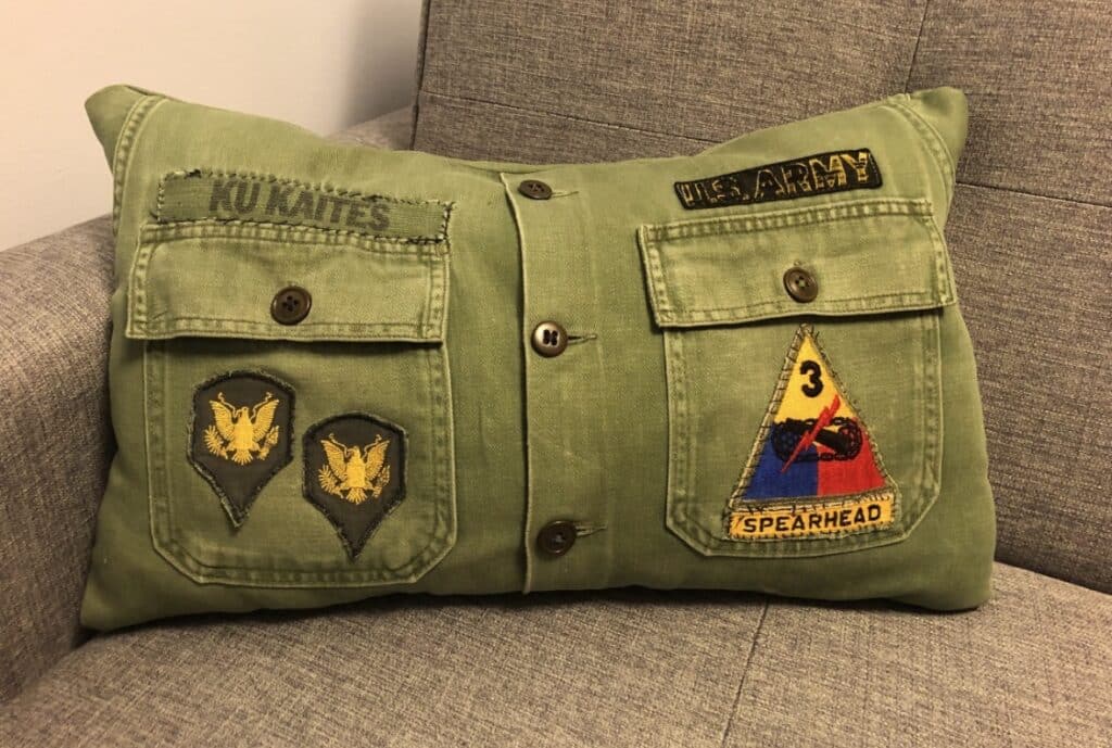 A pillow Wendy Howells made from her father’s U.S. Army shirt, with its original patches.